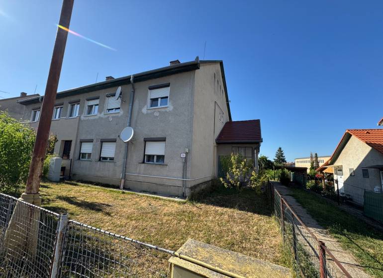 Exterior of a 3-room apartment on Obrancov Mieru Street in Šahy, with a satellite and lawn.