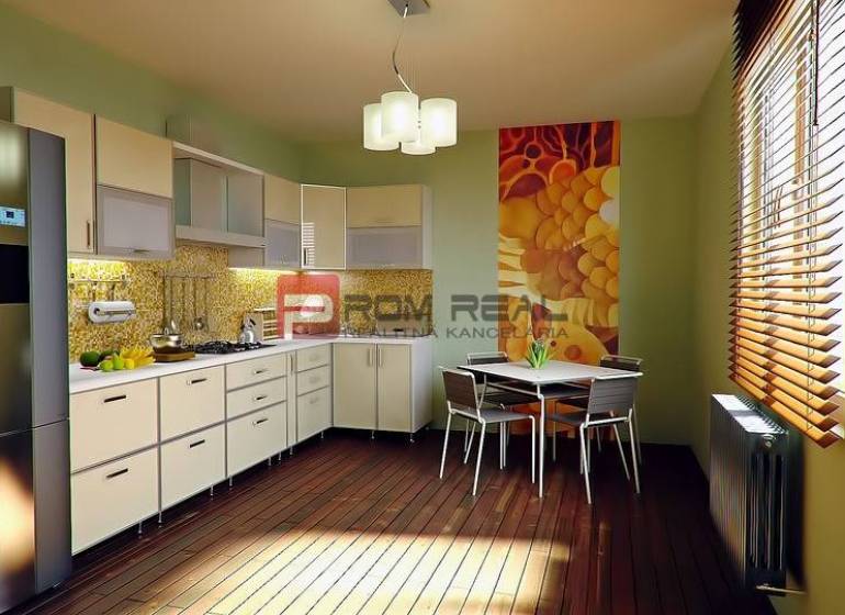 A kitchen in a 3-room apartment with a modern kitchen unit, dining table, and decorative wall.