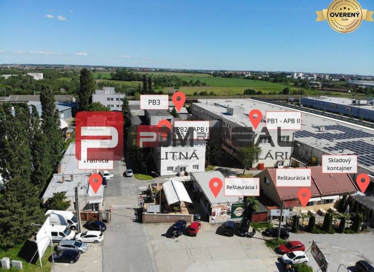 Industrial area on Púchovská Street in Bratislava III with restaurants and warehouses.