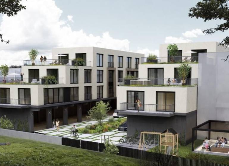 Construction of apartments on M.R. Štefánik Street in Trenčín with modern architecture.
