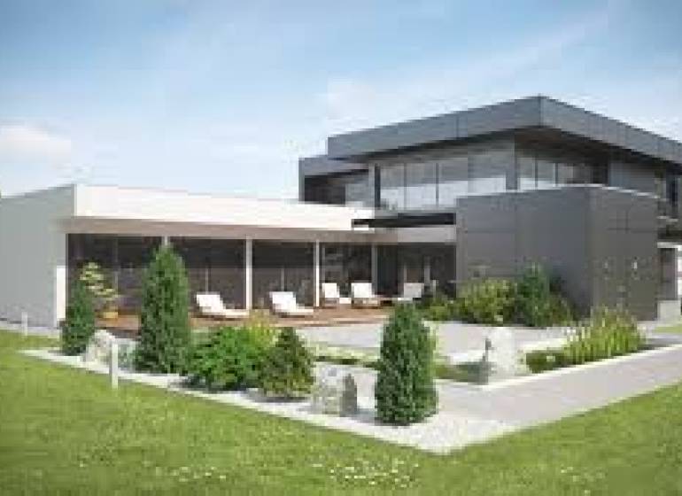 A family house at the Sunny Lakes in Senec next to the real estate agency signs.