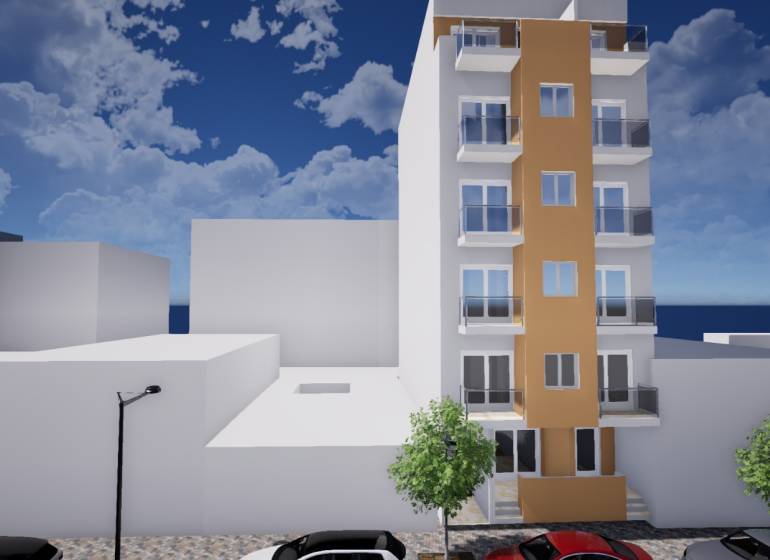 A building in Torrevieja on Campoamor Street 12, with cars parked next to it.