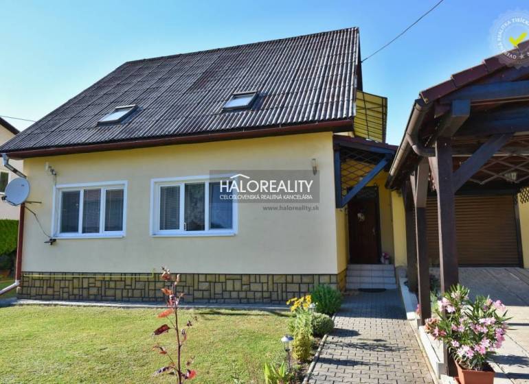 Yellow family house in Župkov with a terrace and garden, parking space.