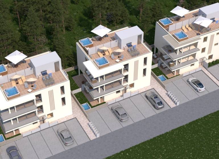 3 modern apartment buildings with terraces, jacuzzis, and parking, surrounded by greenery.