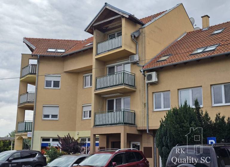 Apartment building on Kysucká Street in Senec with parking and balconies.