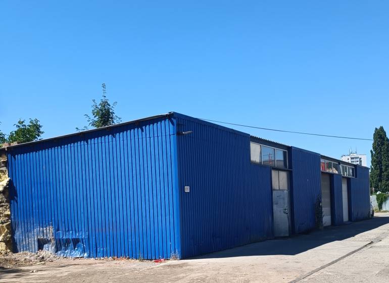 Blue metal warehouse on Textilná Street in Košice - Nad jazerom district.