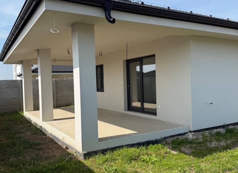 A family house in Galanta Košúty with a terrace and a grassy plot.