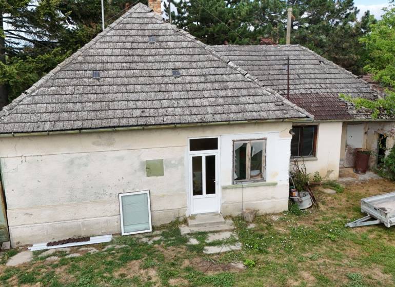 A family house in Kolárovo with a traditional tiled roof and a simple exterior.
