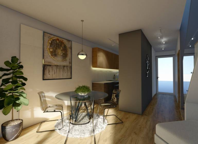 Interior of a 4-room apartment with a dining area, painting, and plants.