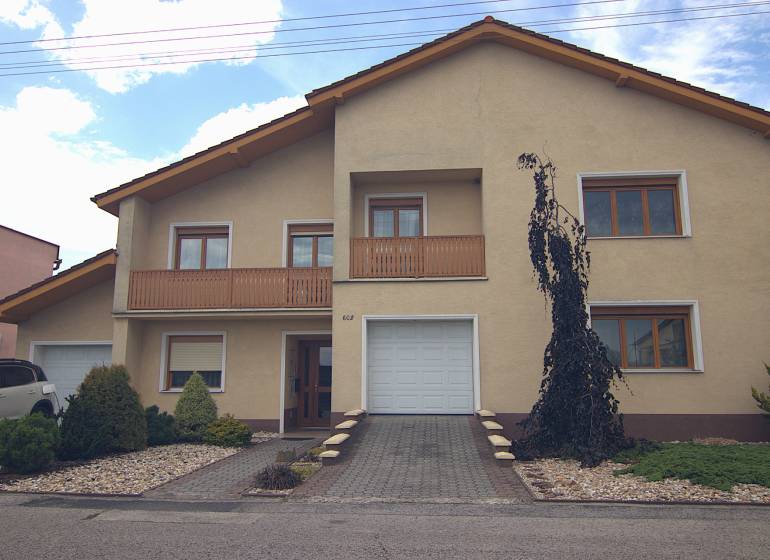 A family house on Športová Street in Brodské with a garage and a garden.
