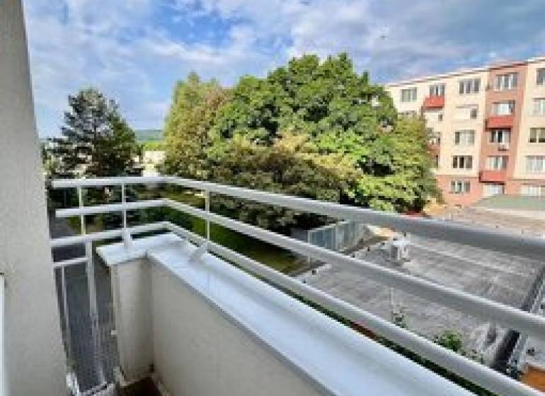 Balcony of a 2-room apartment with a view of greenery and panel buildings, Bratislava - Rača, Pekná cesta.