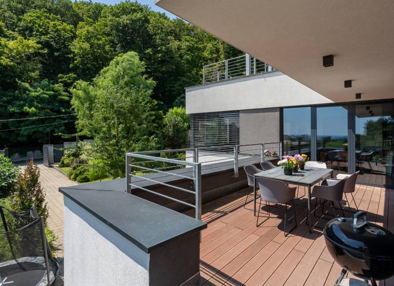 The terrace of a family house on Sliačska Street in Bratislava - Ahoj with a beautiful forest view.