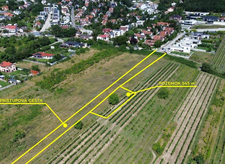 Plots - housing in Bratislava, Rača, with an access road and surroundings of houses.