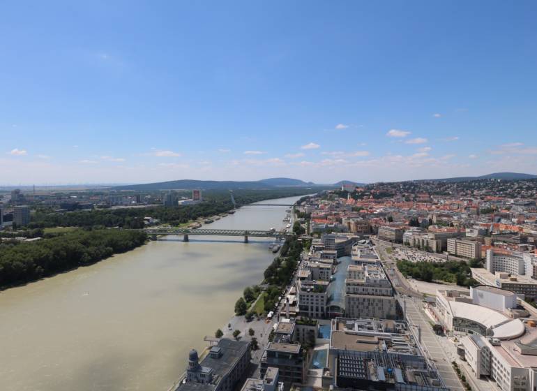 View of the Danube River and buildings in Bratislava - Old Town from Pribinova Street.