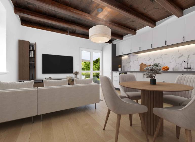 Living room with a wooden ceiling, kitchen, and dining area in a family house.