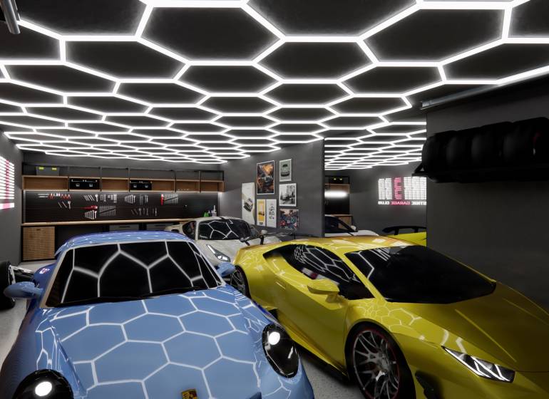 Luxury interior of commercial spaces with cars and unique ceiling design.