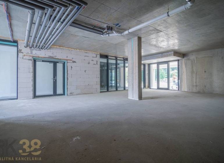 Commercial spaces with large glass facades and concrete elements in Svit.