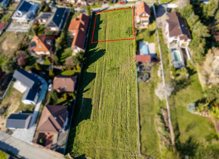 Plots - housing on Štúrova Street in Marianka, surrounded by family houses.