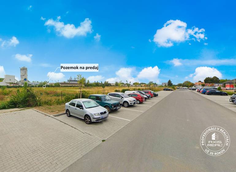 Parking lot next to a commercial property on Priemyselná Street in Piešťany.
