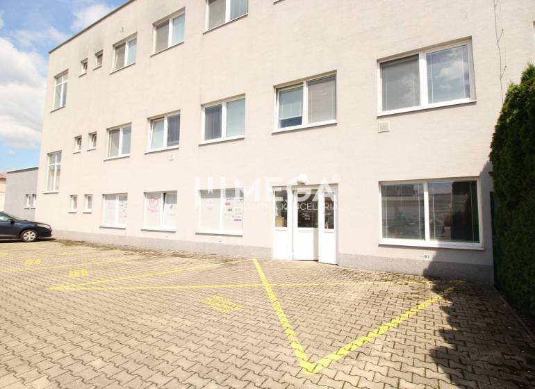 Commercial premises on Tolstého Street in Humenné with entrance doors and a parking lot.