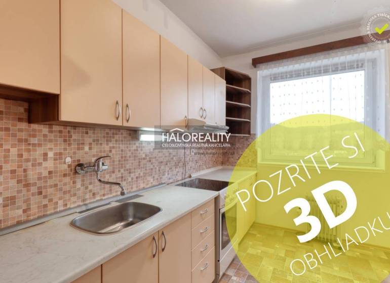 The kitchen of a 3-room apartment with light furniture and mosaic tiles.