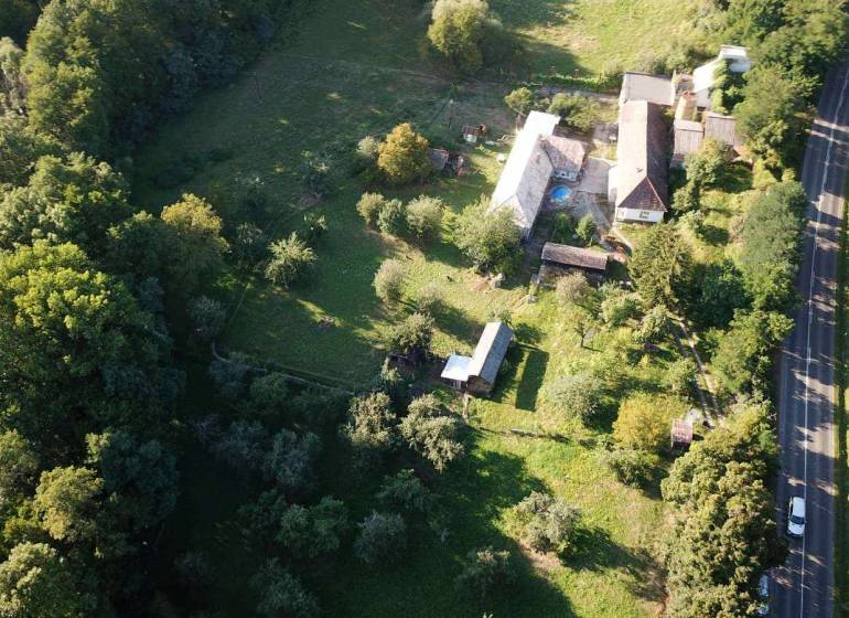Aerial view of a building, trees, on A.H. Škultétyho Street, residential plots.