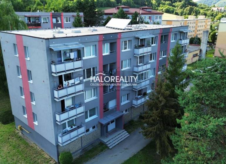 An apartment building in Hnúšťa surrounded by greenery offers 4-room apartments with sunny balconies.
