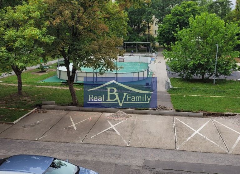 View from a 3-room apartment on Ostredkova Street in Bratislava - Ružinov with a parking lot.