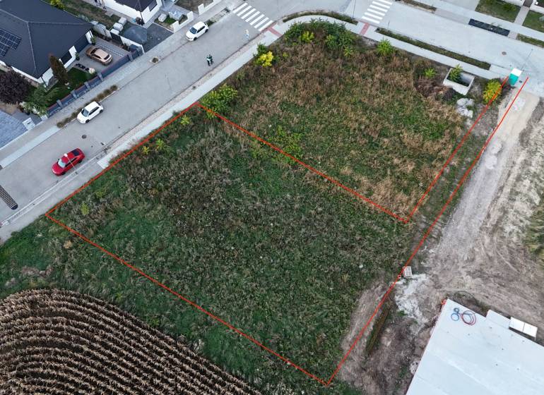 Aerial view of marked plots - housing in the village of Voderady.