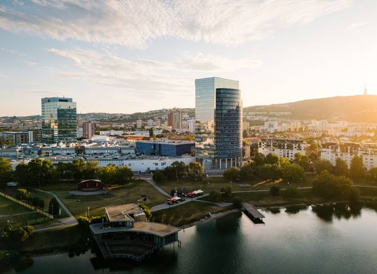 View of offices in Bratislava - Nové Mesto, Vajnorská, and towers by the lake.