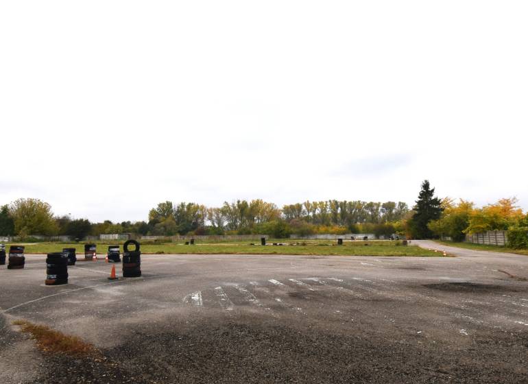 Lands - commercial on Nebojsa Street in Galanta, visible asphalt area and trees.