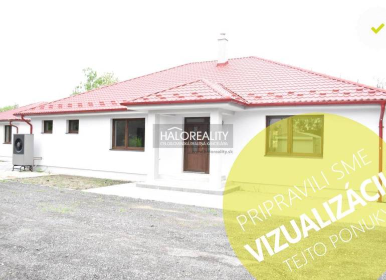 A family house in Závod with a red roof and white facade.