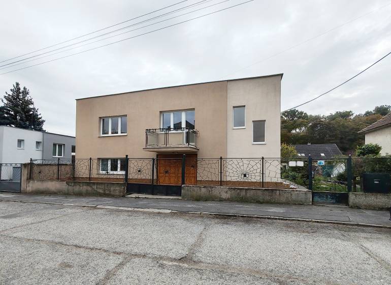 A family house on Topoľová Street in Sereď with a simple facade and a garden.