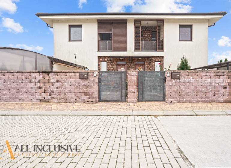 Two-story house with a brick fence in Gabčíkovo, suitable for a 3-room apartment.