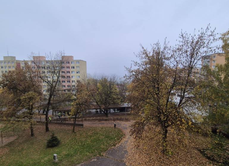 A housing estate with panel buildings and an autumn scene on Ovručská Street in Košice, Dargovských Hrdinov district.