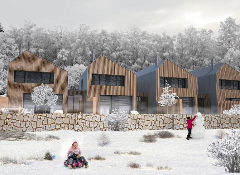 A family house in Turecká, snowy environment, children playing in the snow in front of the house.