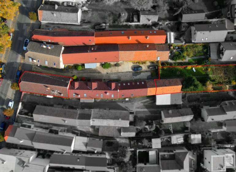 A view from above of family houses and gardens on Alstrova Street in Bratislava - Rača.