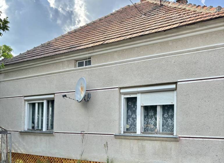 A family house in Bátorove Kosihy with a classic facade and a sloped roof.