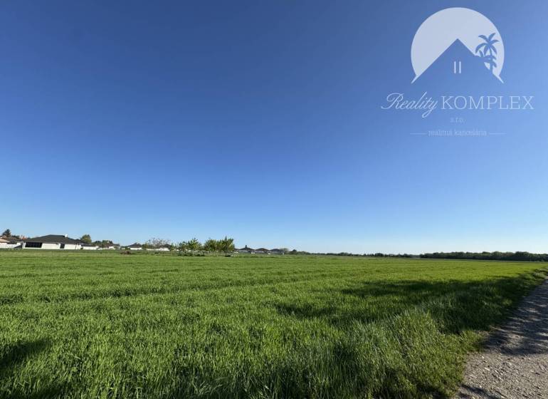 Plots - housing in Kostolné Kračany with open countryside and access road.