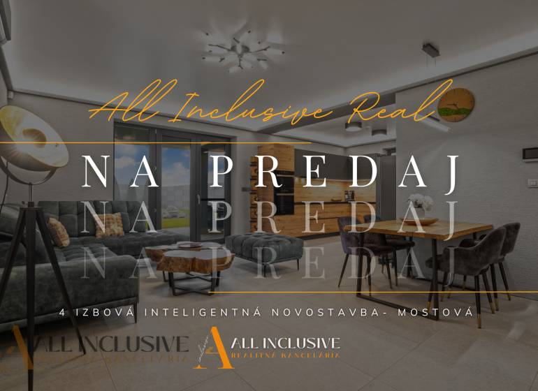 Living room with a sofa and dining table in a family house with a wooden decor floor.