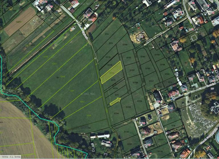 Aerial view of plots - housing in the village of Svinia. Accessible green plots.