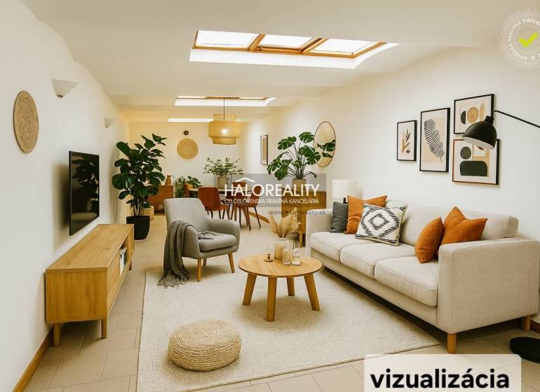 A bright commercial space with a sofa, plants, and decorations on the walls.