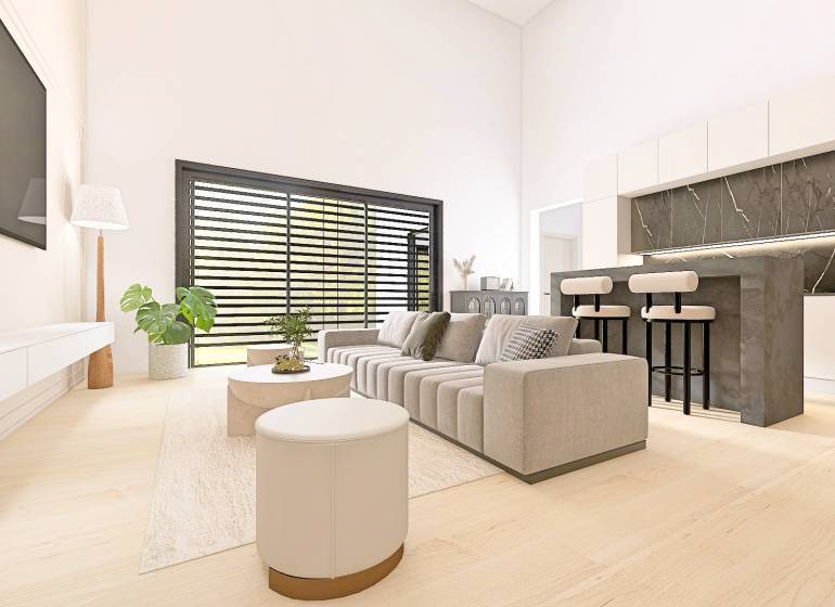 Living room in a family house with a sofa, television, bar counter, and wooden decor flooring.