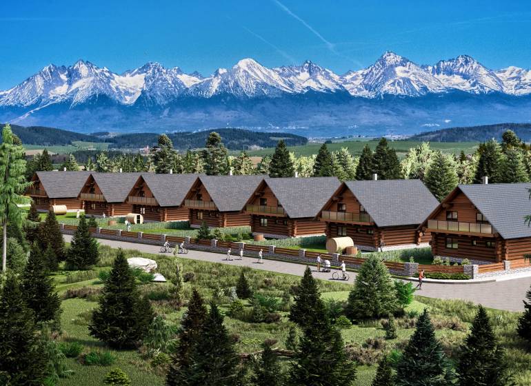Construction of houses in Nová Lesná with a view of the snow-capped peaks of the Tatras.