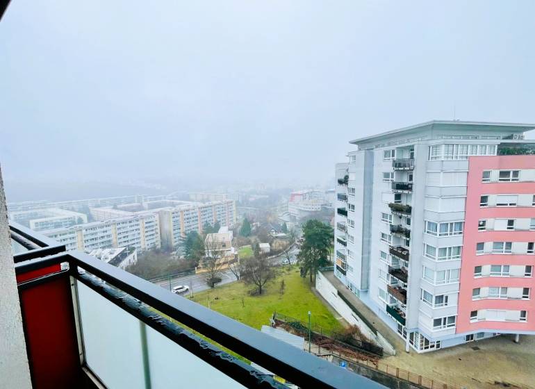 View from a 3-room apartment in Bratislava - Karlova Ves to panel and residential buildings.