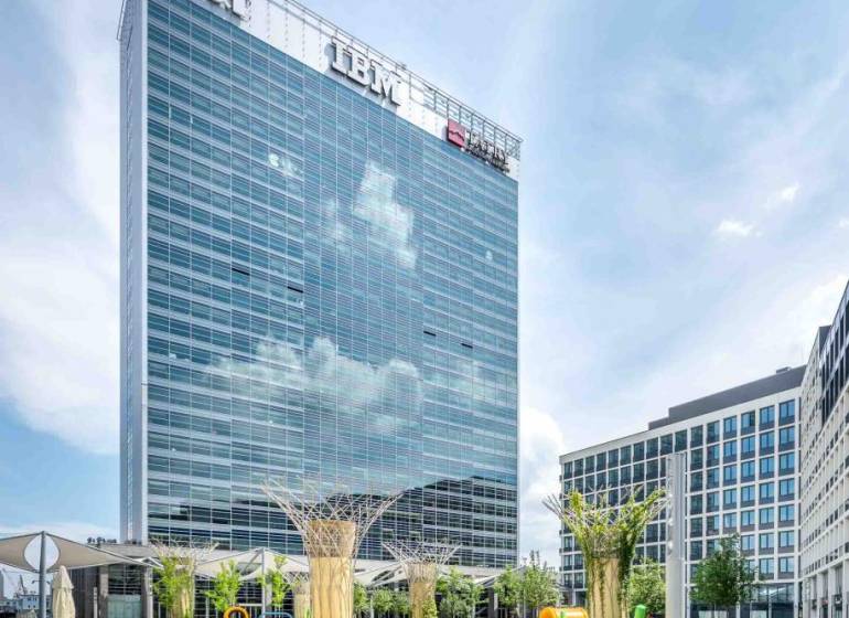 Bratislava - Old Town; Offices on Pribinova Street with a playground in the foreground.