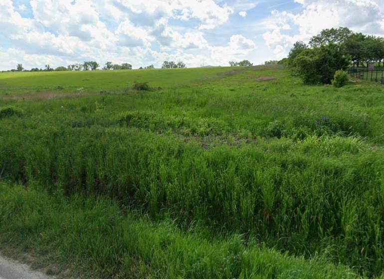 Land for residential use in Lomnicka, Vranov nad Topľou, with grassy area and hilly landscape.