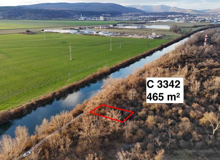 Aerial view of recreational plots in Nová Ves nad Váhom near the river and the grove.
