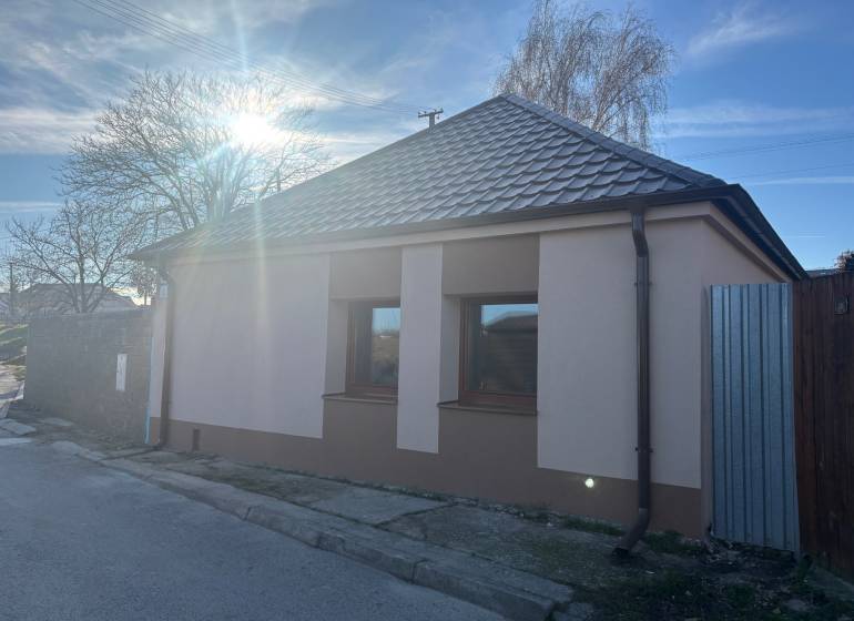 A family house in Blatné with a hipped roof and simple facade.
