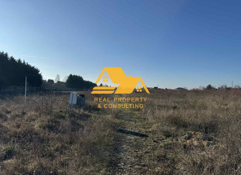 Land - housing in Nové Zámky on the street Nové Zámky, with open nature and vegetation.